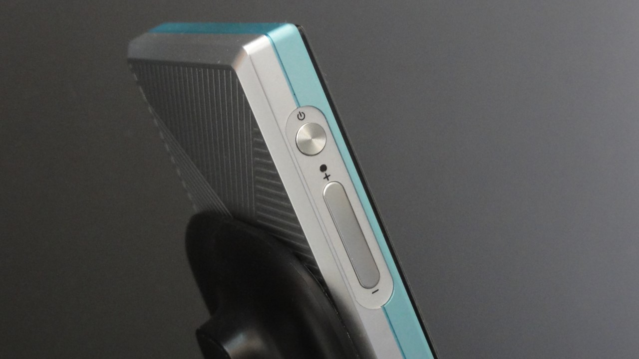 Power on/off/lock button and volume button of the FiiO JM21 Digital Audio Player (DAP).