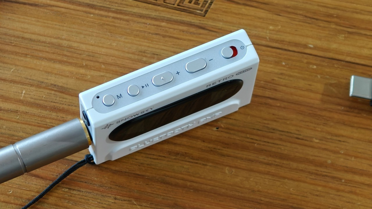 Physical buttons of the SnowSky Retro Nano DAC and amplifier.