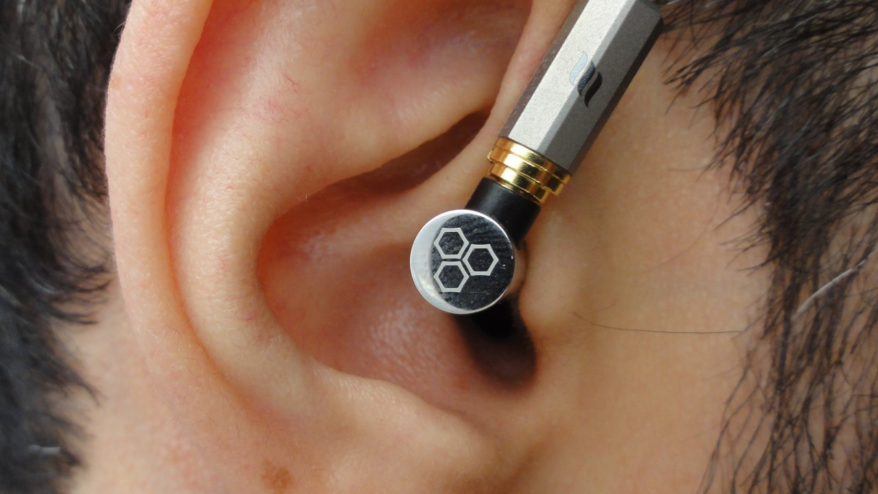 Insertion of the Final E5000 in-ear monitor.