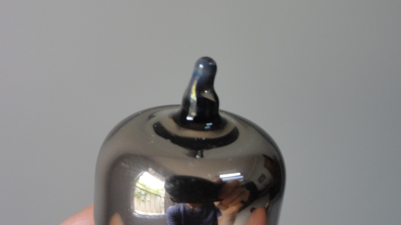 White metallic flash indicating that the tube has failed.