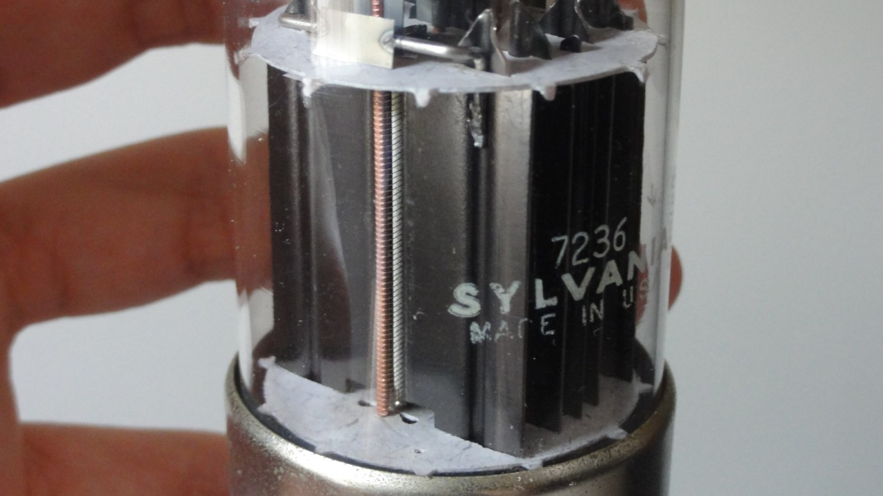 Circular components with multiple protrusions made of insulating material inside a tube.